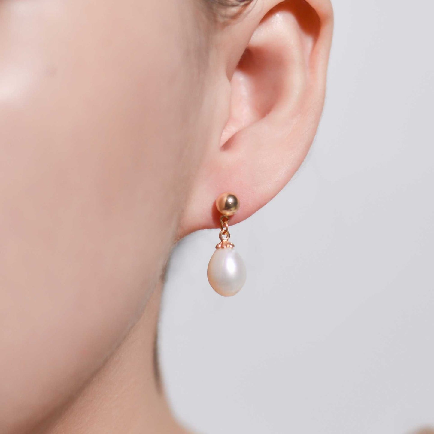 11.5 mm white teardrop pearl yellow gold plated dangling earrings