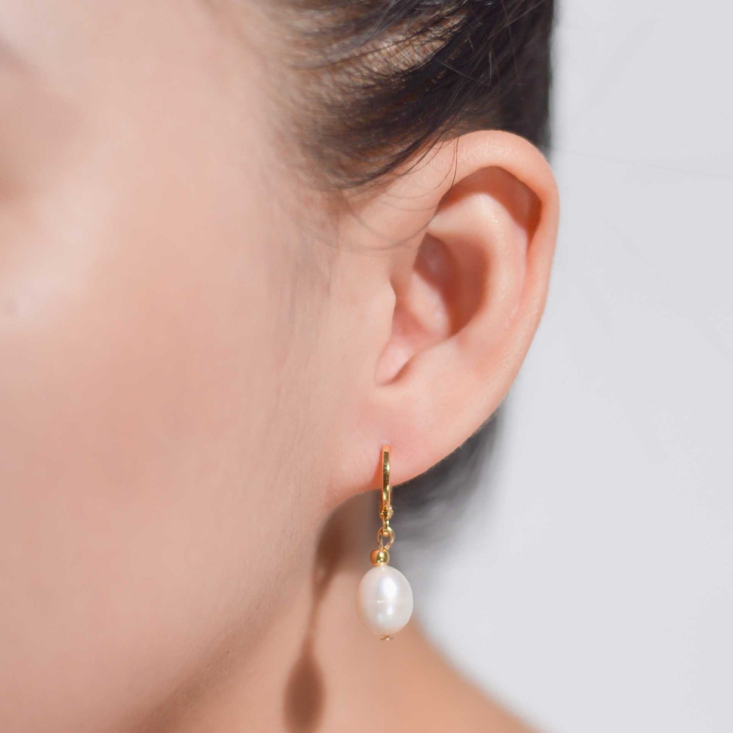 11 mm white oval dangling pearls yellow gold plated earrings