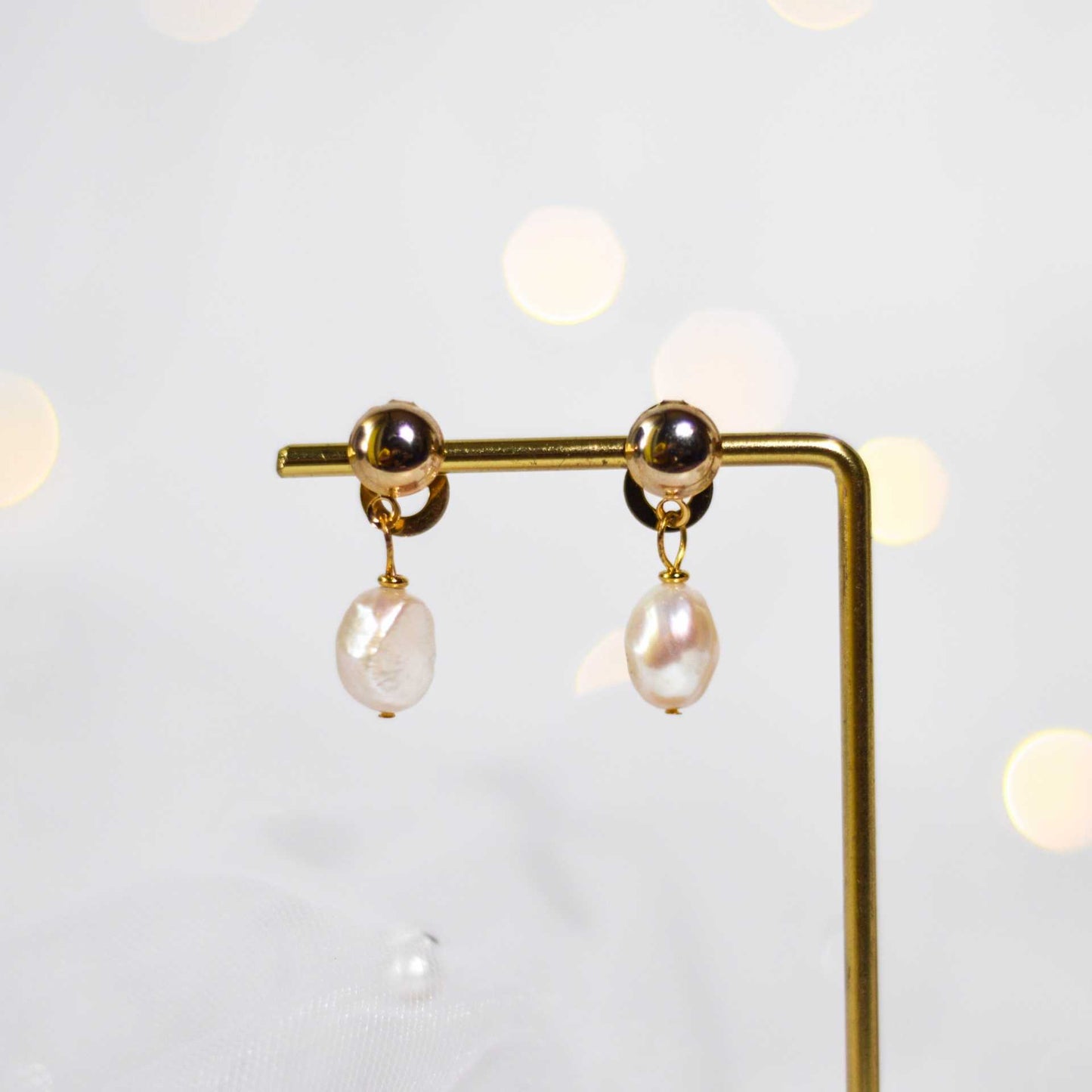 12 mm white baroque pearl dangling yellow gold plated with 8.5 mm round stud earrings