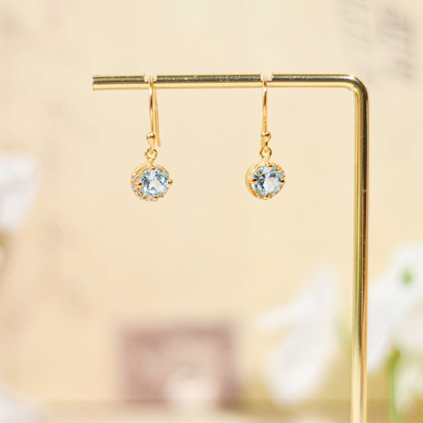 6 mm Round cut Blue Topaz with Crescent Cz Earrings