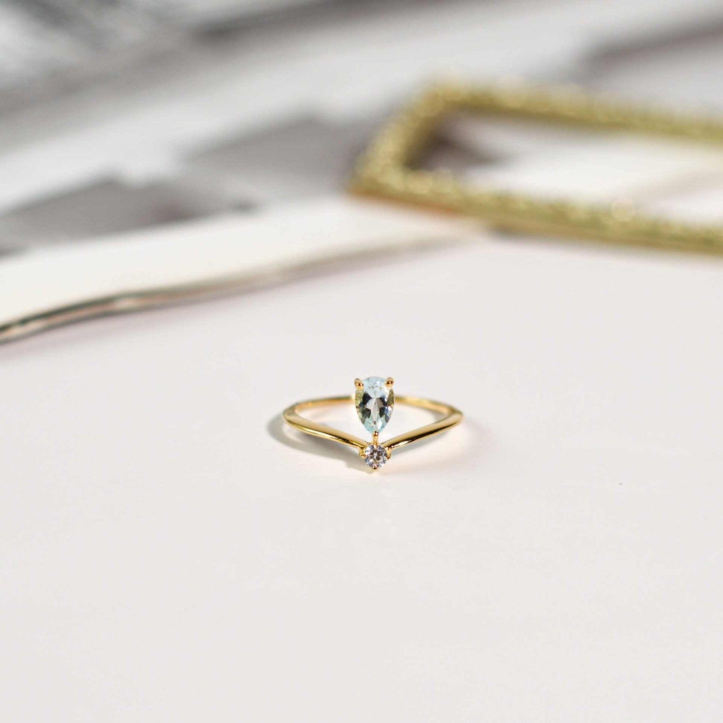 6 x 4 mm Pear cut Blue Topaz with Cz Accent Tiara Ring