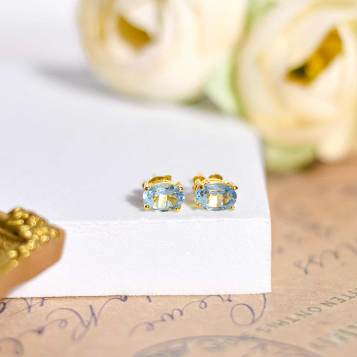 7 x 5 mm Oval cut Blue Topaz Earrings