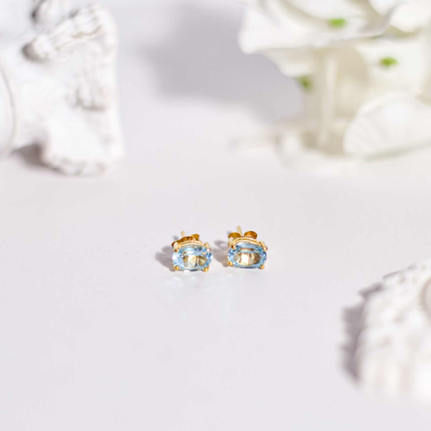 7 x 5 mm Oval cut Blue Topaz Earrings