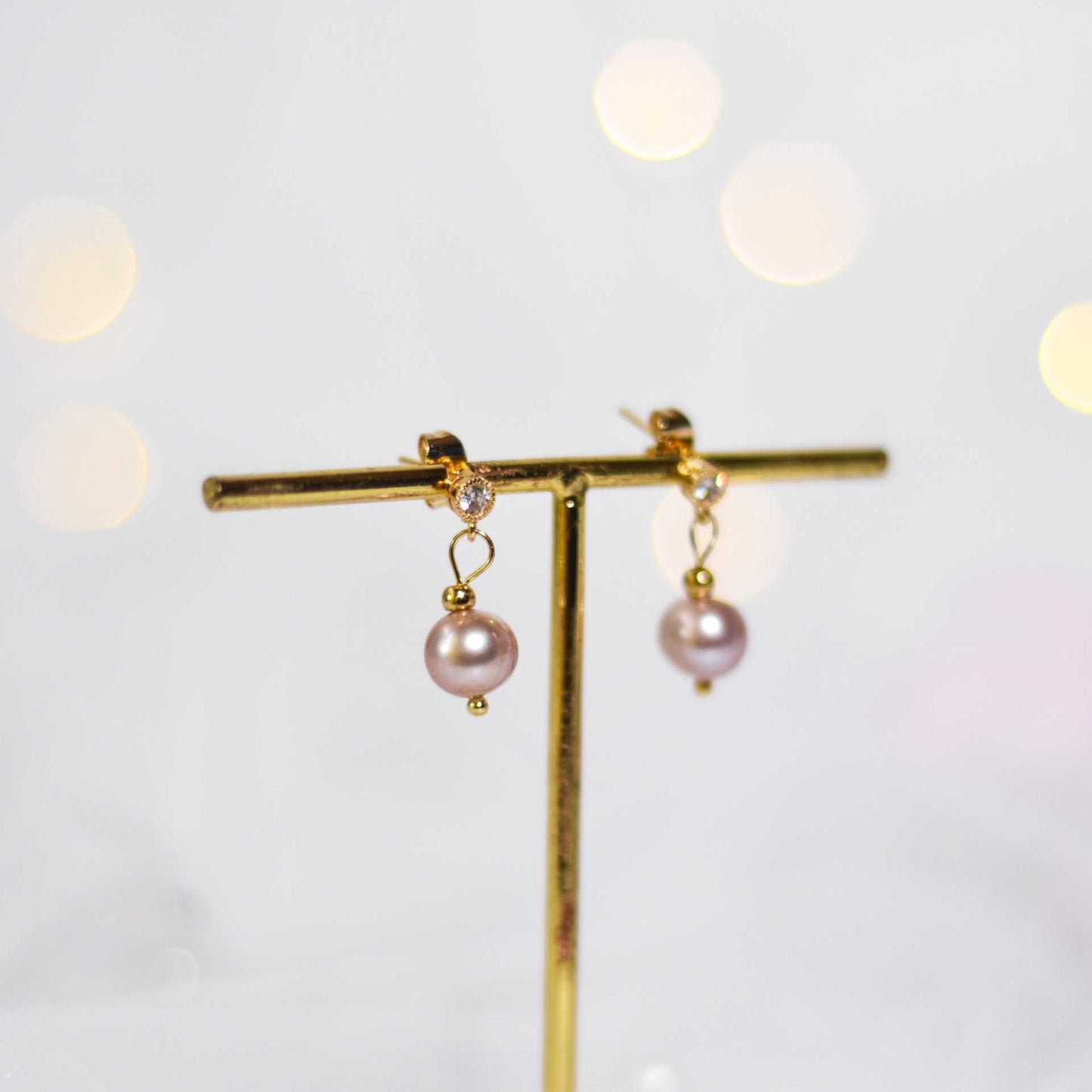 8.6 mm purple semi-round pearl yellow gold plated dangling with 4 mm zircon stud earrings