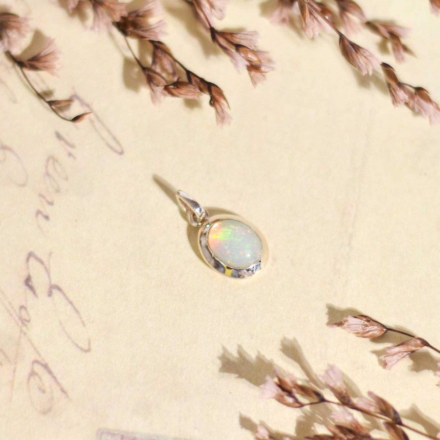 9 x 7 mm Oval cut Opal Cabochon Pendant