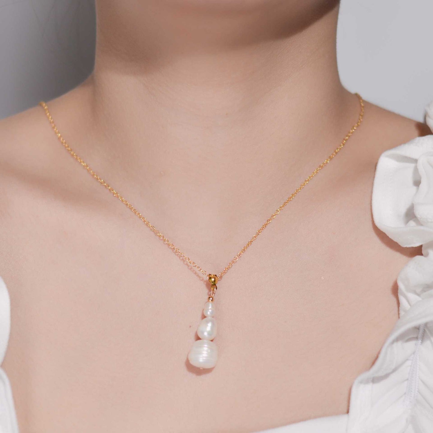 Multi-tier pearl pendant yellow gold plated necklace