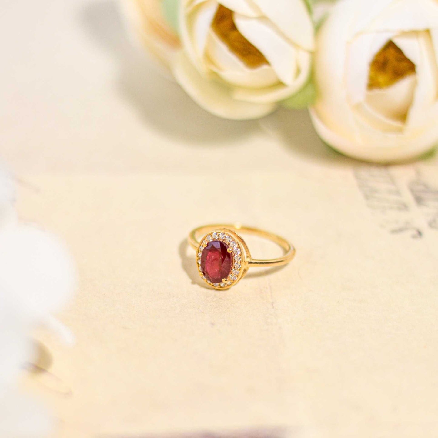 8 x 6 mm Oval cut Ruby with Cz Halo Yellow Gold plated Ring