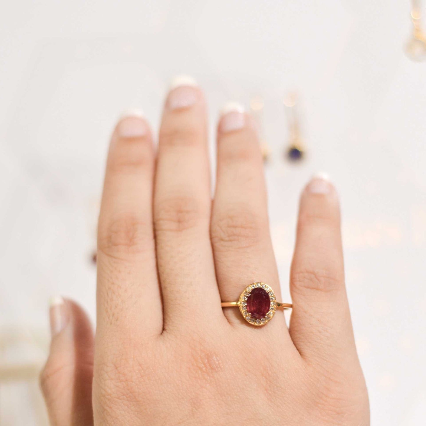 8 x 6 mm Oval cut Ruby with Cz Halo Yellow Gold plated Ring