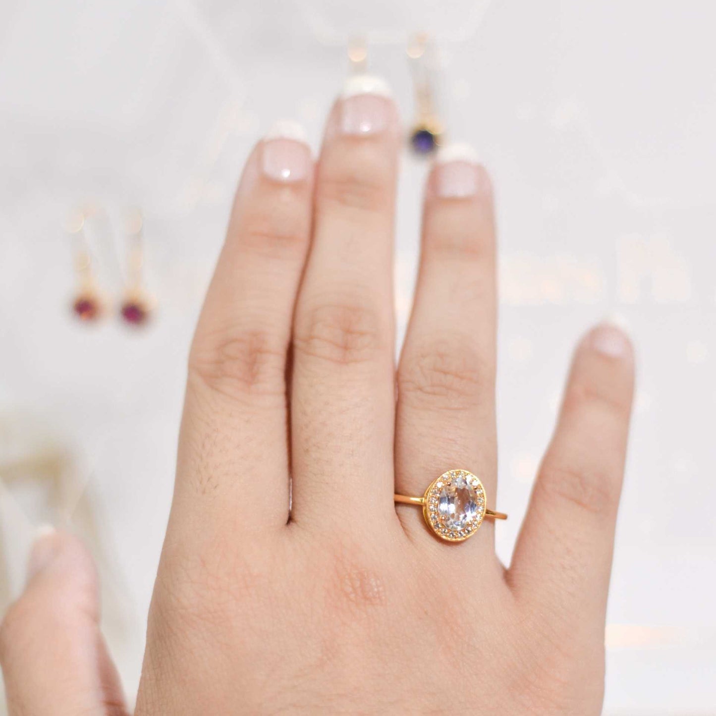 8 x 6 mm Oval cut White Topaz with Cz Halo Yellow gold plated Ring