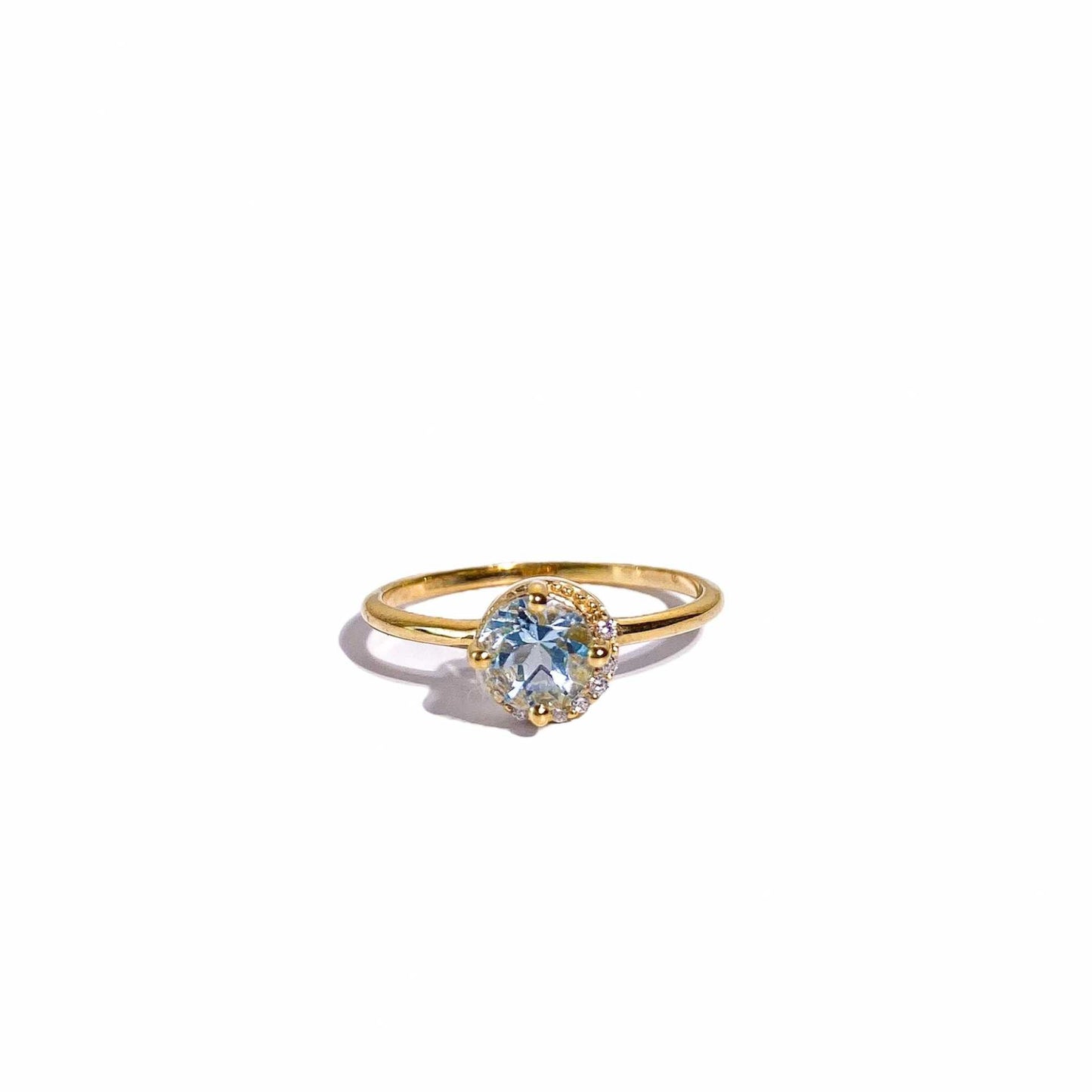 6 mm Round cut Swiss Blue Topaz with Crescent Cz Yellow gold plated Ring