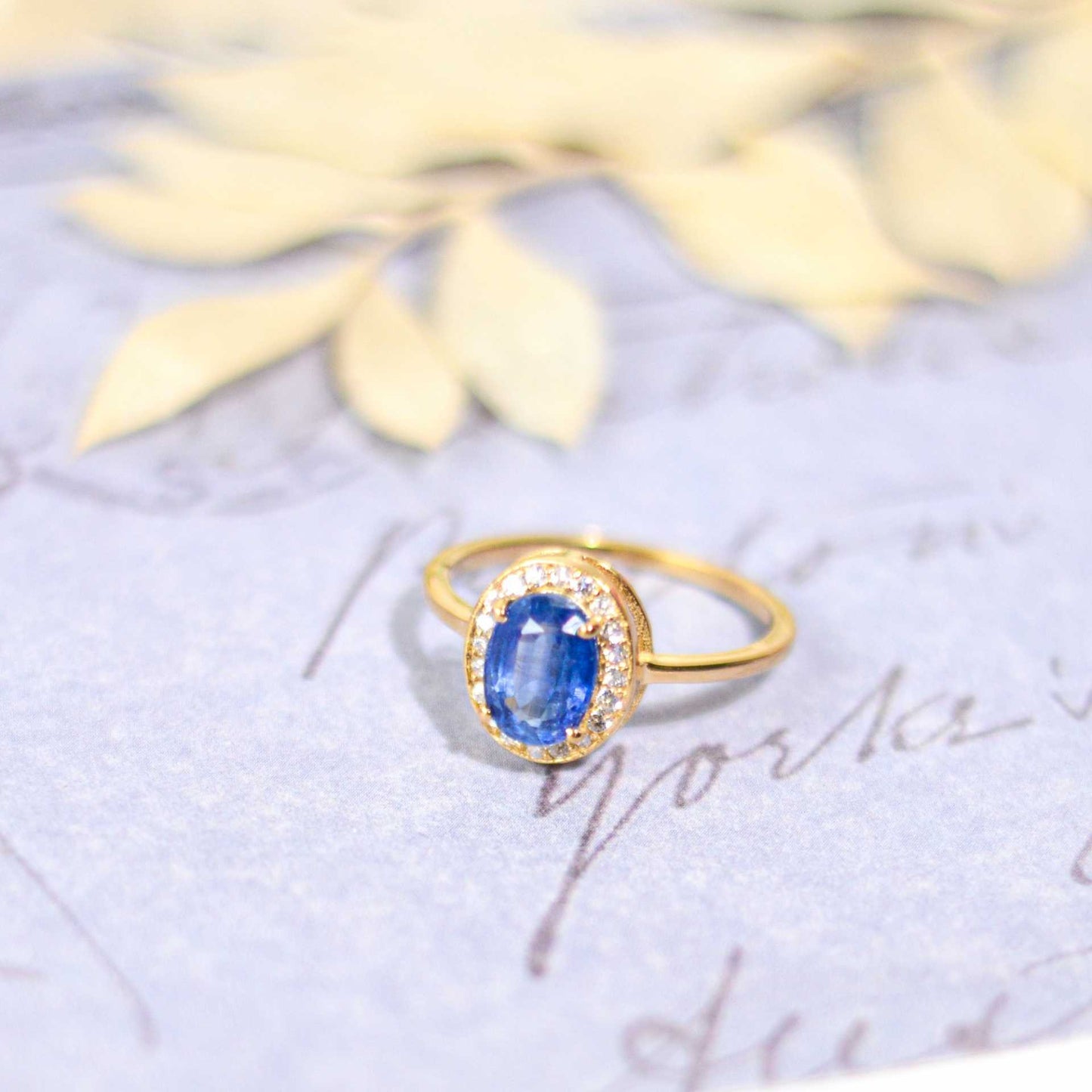 8 x 6 mm Oval cut Kyanite with Cz Halo Ring