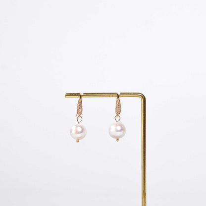 10.6 mm round pearl dangling yellow gold plated inlaid zircon earrings