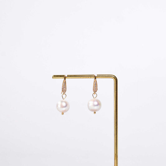 10.6 mm round pearl dangling yellow gold plated inlaid zircon earrings