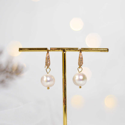 10.6 mm round pearl dangling yellow gold plated inlaid zircon earrings