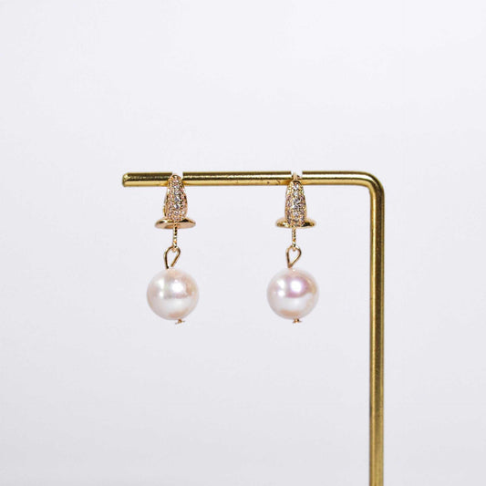 10.8 mm white round pearl dangling with inlaid zircon yellow gold plated earrings