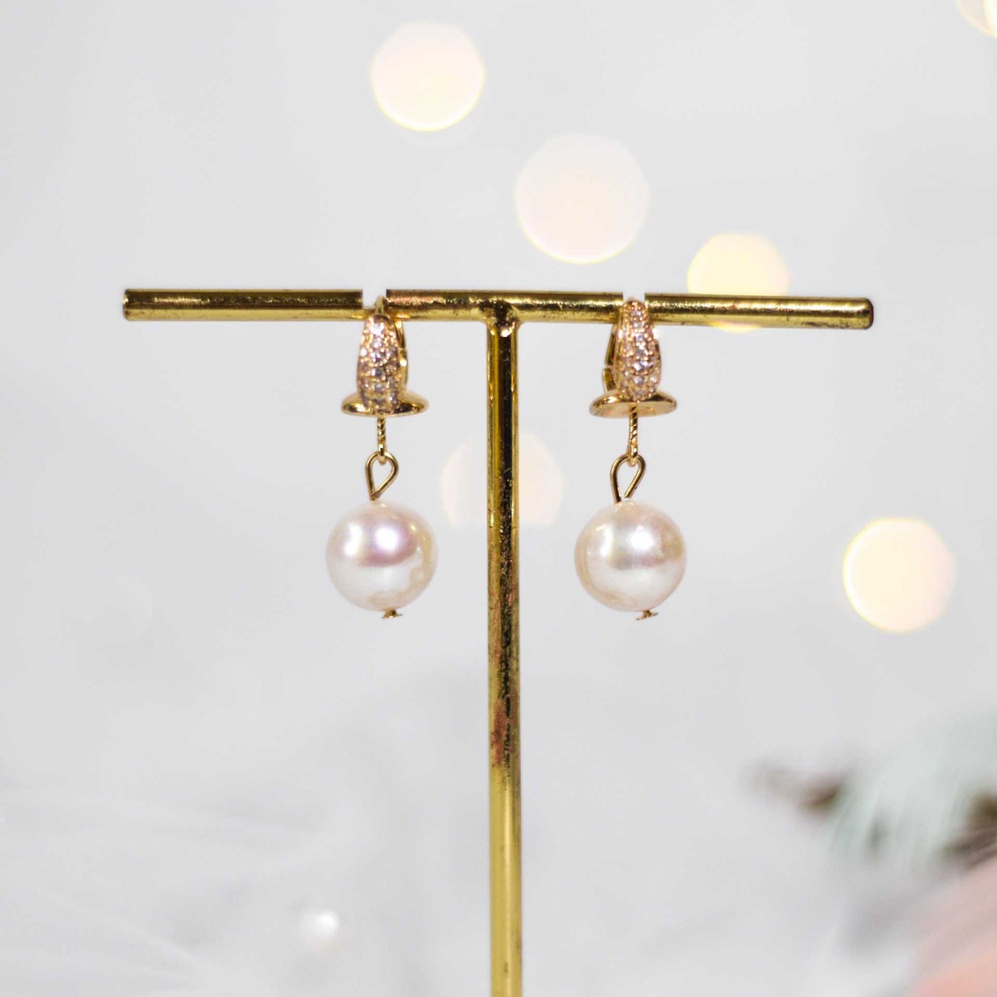 10.8 mm white round pearl dangling with inlaid zircon yellow gold plated earrings