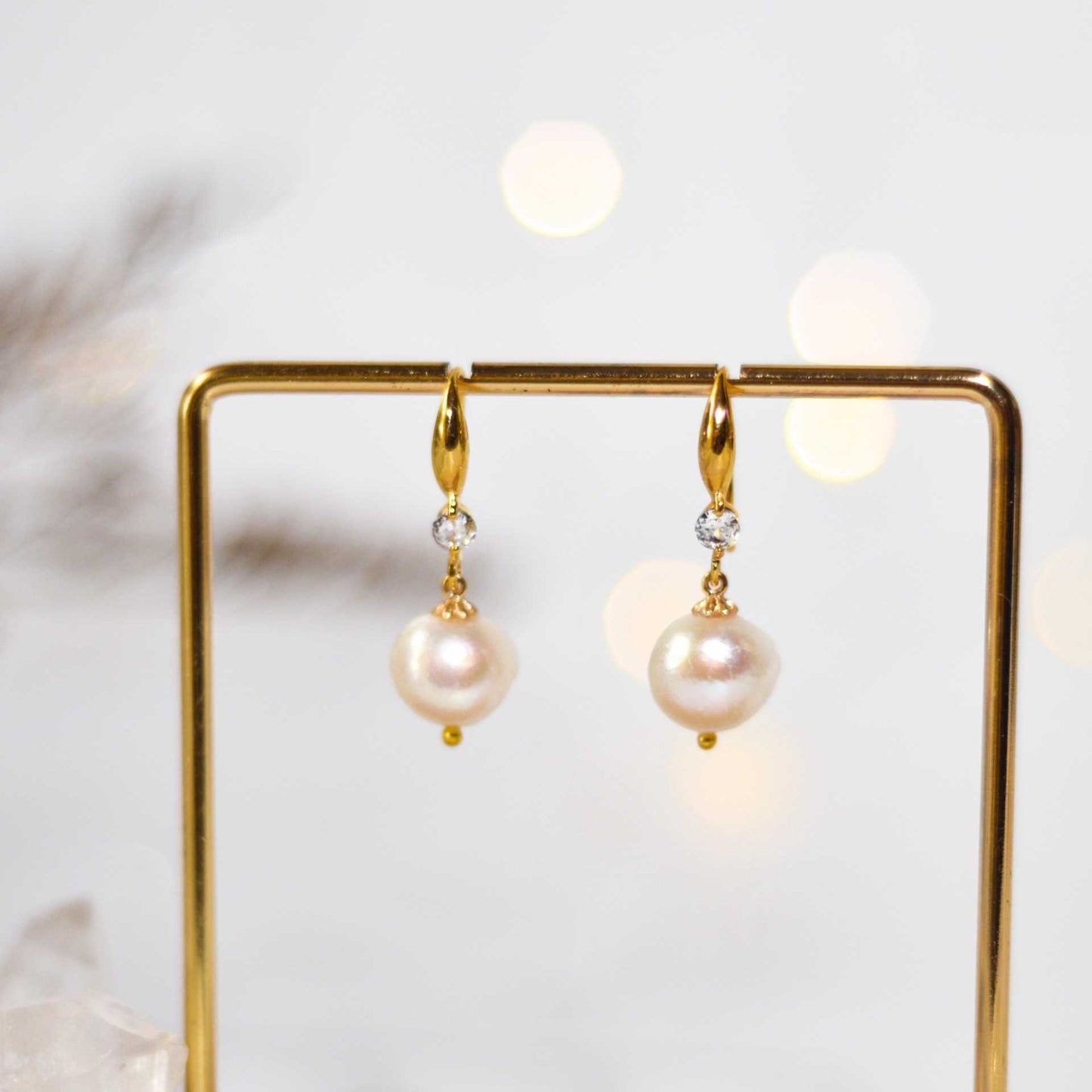 11 mm white kieshe pearl dangling yellow gold plated with zircon earrings