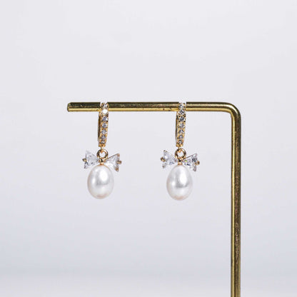 12 mm White Biwa Pearl Yellow Gold Plated Zircon Inlaid Dangling with Zircon Bow Earrings