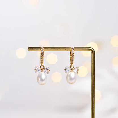 12 mm White Biwa Pearl Yellow Gold Plated Zircon Inlaid Dangling with Zircon Bow Earrings