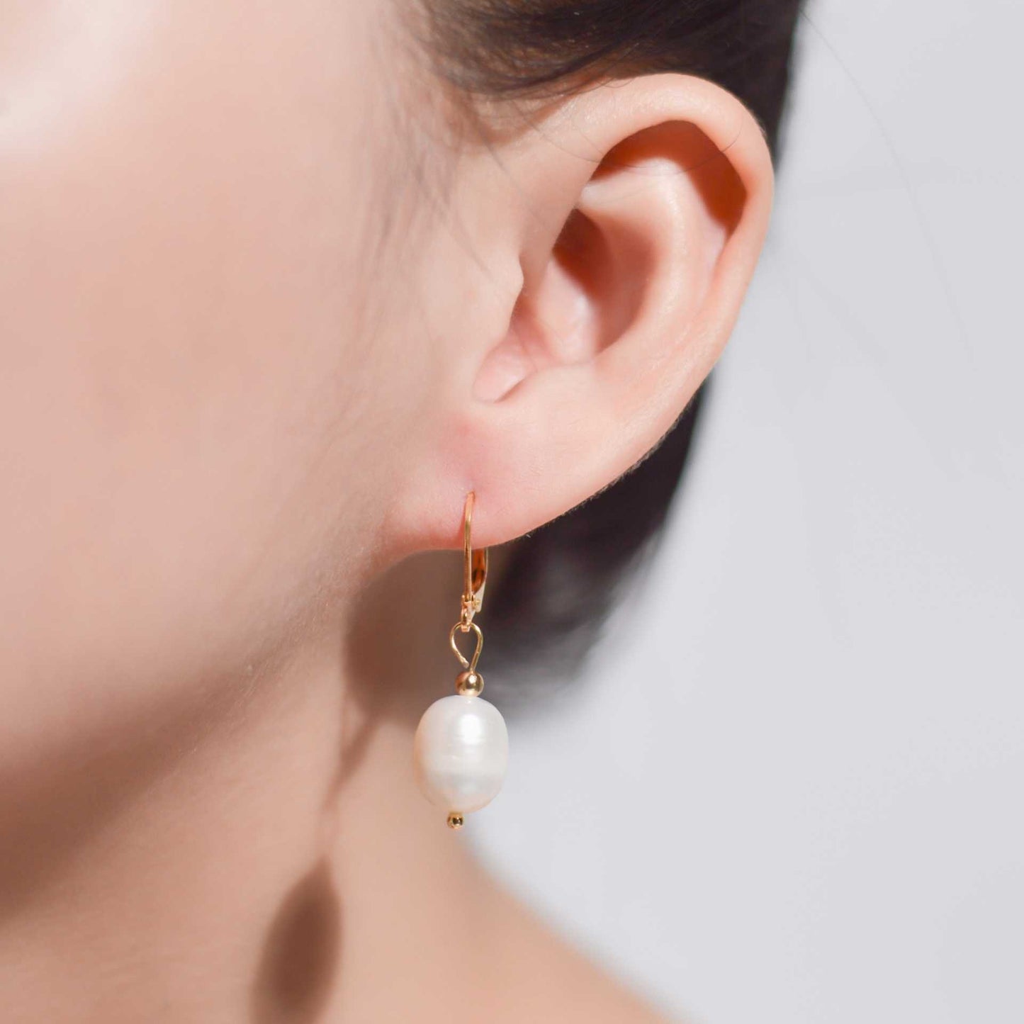 12 mm white biwa dangling yellow gold plated earrings