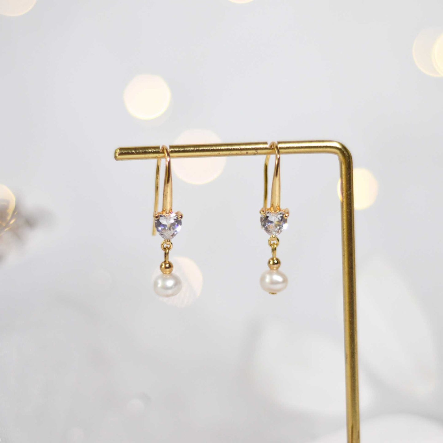 6 mm white siopao pearl dangling yellow gold plated with 6 mm heart zircon earrings