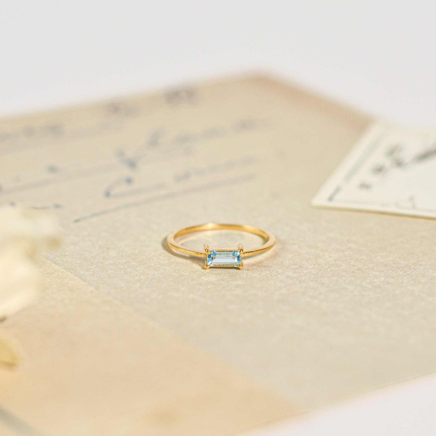 6 x 3 mm Baguette cut Blue Topaz Ring