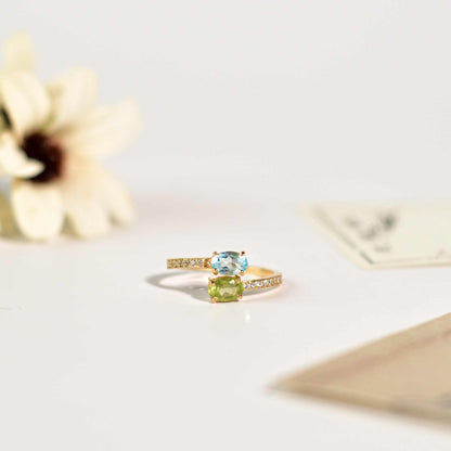 6 x 4 mm Oval cut Blue Topaz and Peridot Open Ring