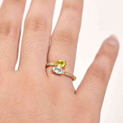 6 x 4 mm Oval cut Blue Topaz and Peridot Open Ring