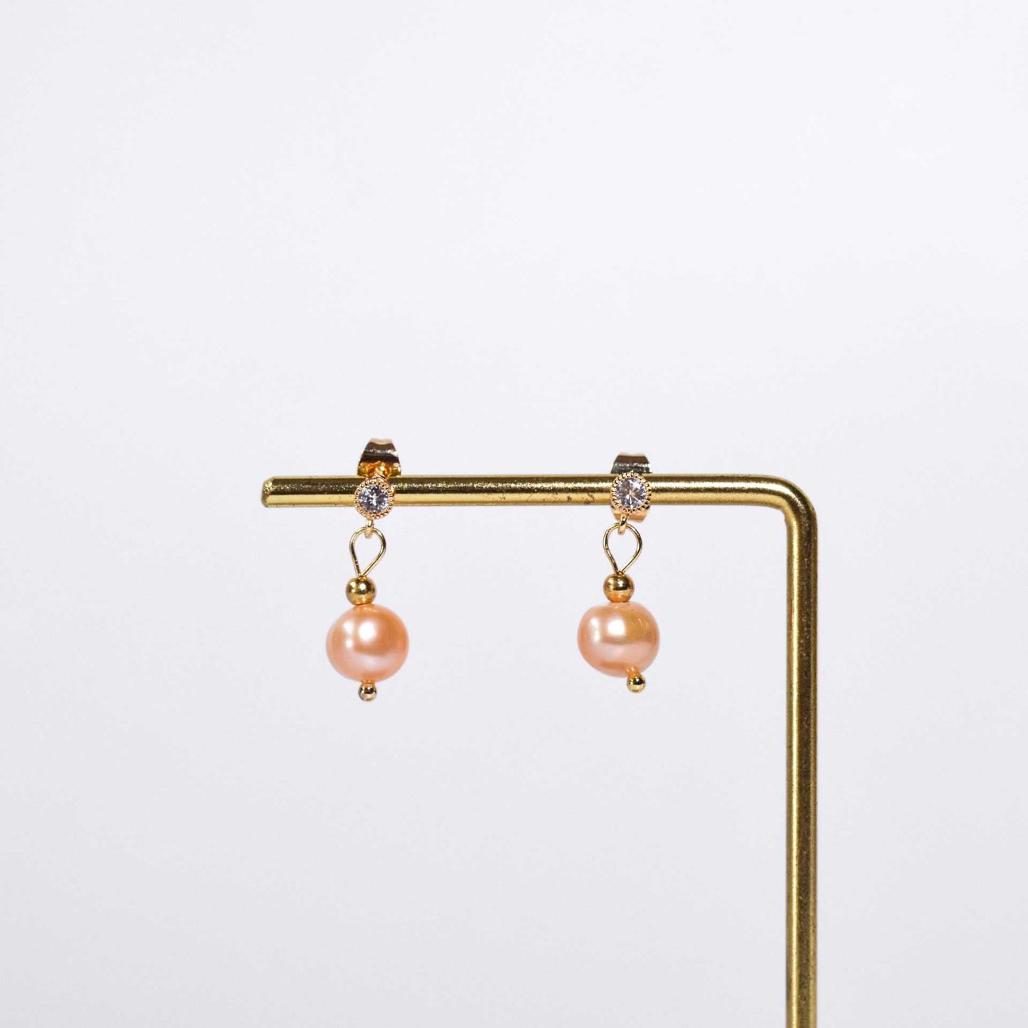 8.1 mm peach semi-round pearl yellow gold plated dangling with 4 mm zircon stud earrings