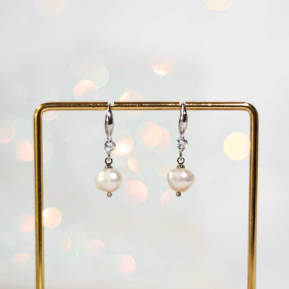 8.3 mm white kieshe pearl dangling rhodium plated with zircon earrings