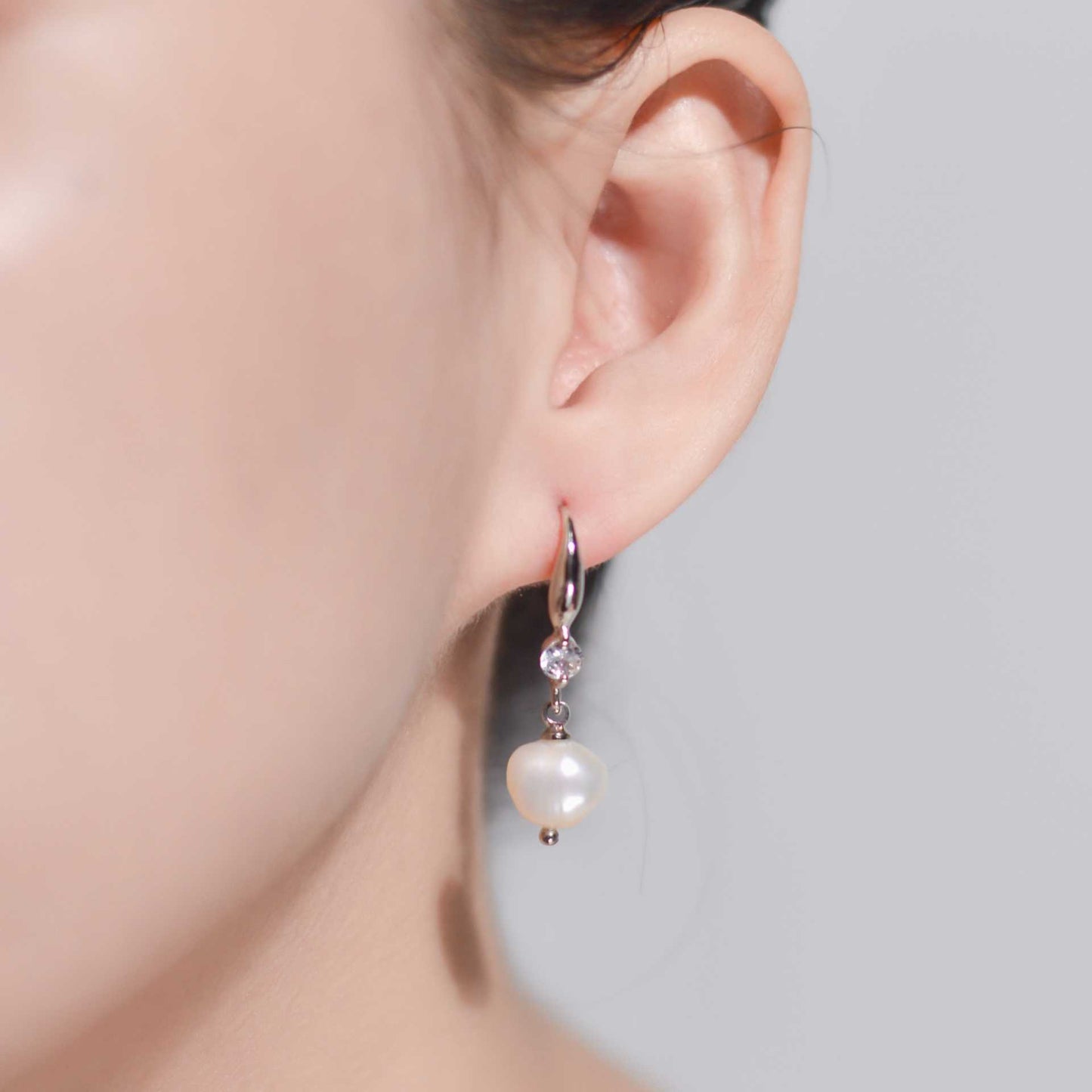 8.3 mm white kieshe pearl dangling rhodium plated with zircon earrings