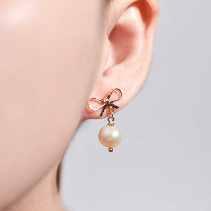 8.5 mm White Kieshe Pearl Yellow Gold Plated with Bow Stud Earrings
