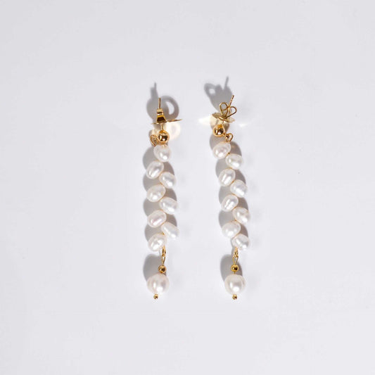 8 pcs. White dancing pearls with 7.8 mm semi-round pearl yellow gold plated dangling earrings