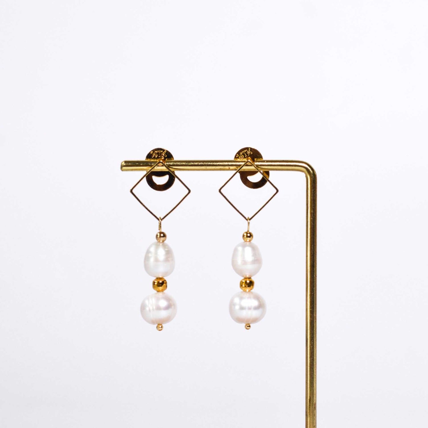 Multi-tier white biwa and oval pearls diamond-shaped dangling yellow gold plated earrings