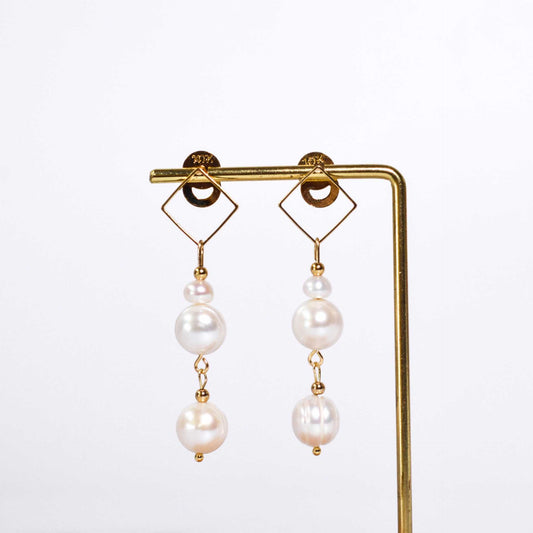 Multi-tier white siopao and round pearls diamond-shaped dangling yellow gold plated earrings