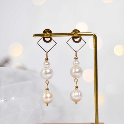Multi-tier white siopao and round pearls diamond-shaped dangling yellow gold plated earrings