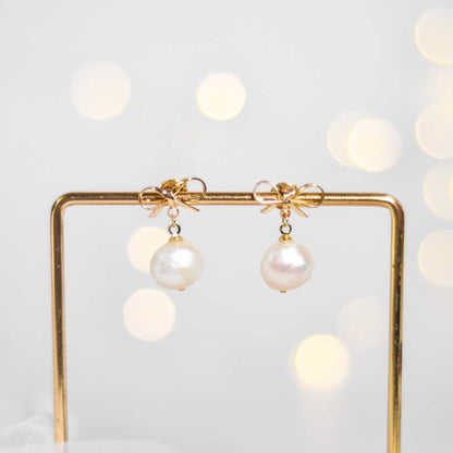 10.8 mm White Kieshe Pearl Yellow Gold Plated with Bow Stud Earrings