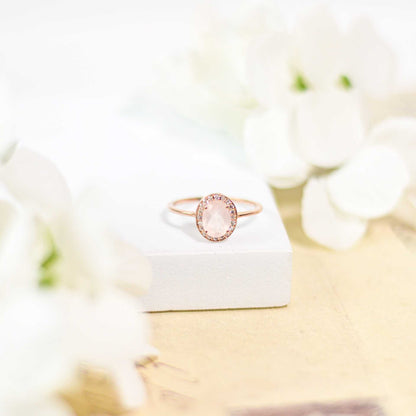 8 x 6 mm Oval cut Rose Quartz with Cz Halo Rose gold plated Ring