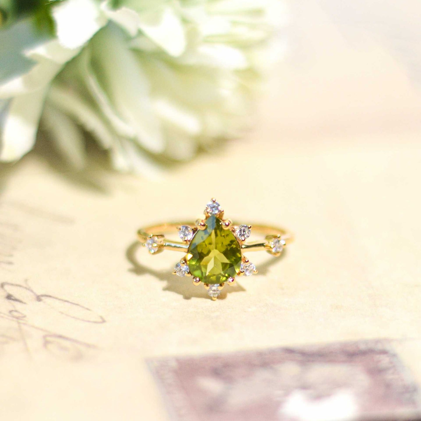 8 x 6 mm Pear cut Peridot Sunburst Ring