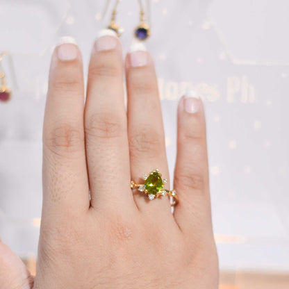 8 x 6 mm Pear cut Peridot Sunburst Ring