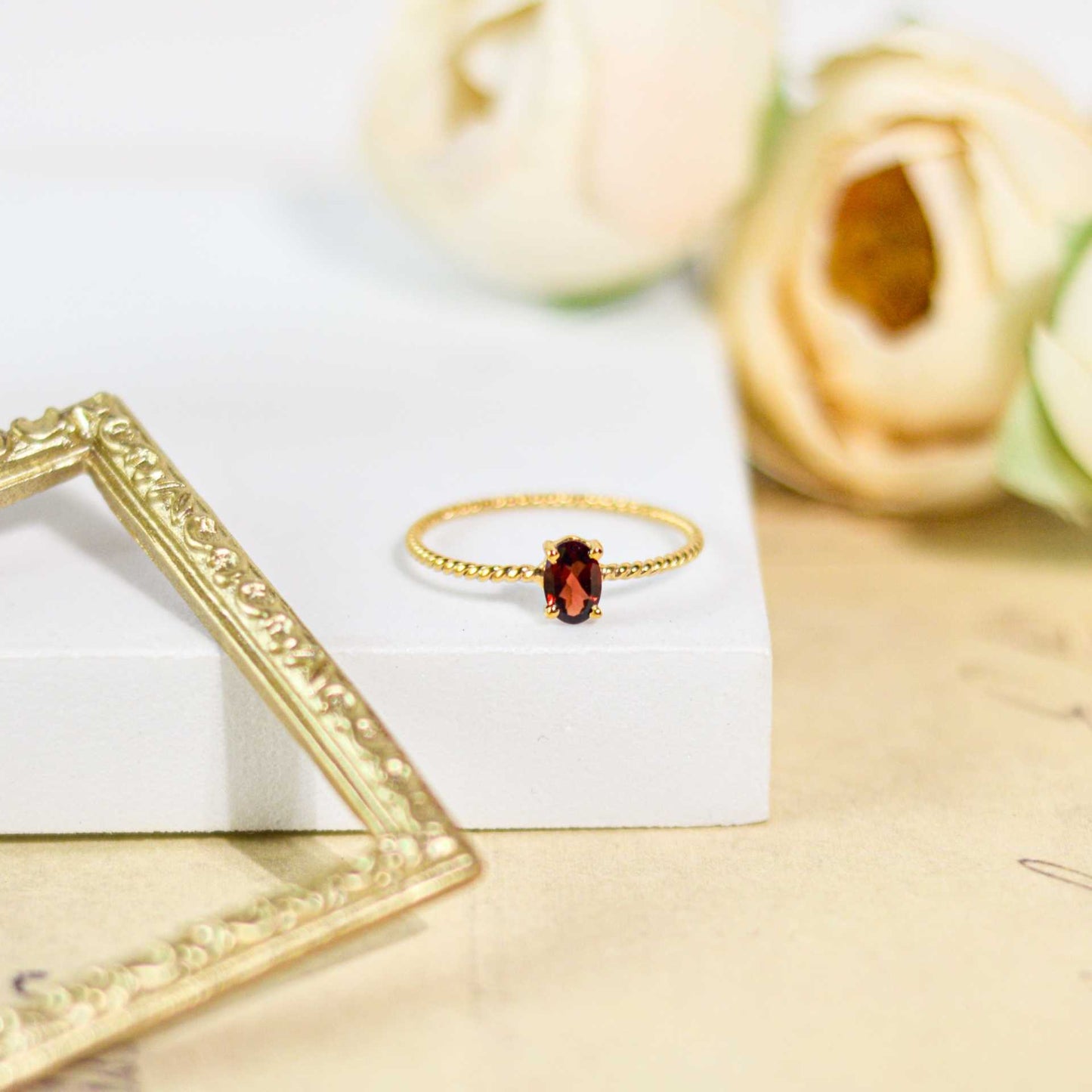 6 x 4 mm Oval cut Red Garnet Twisted Ring
