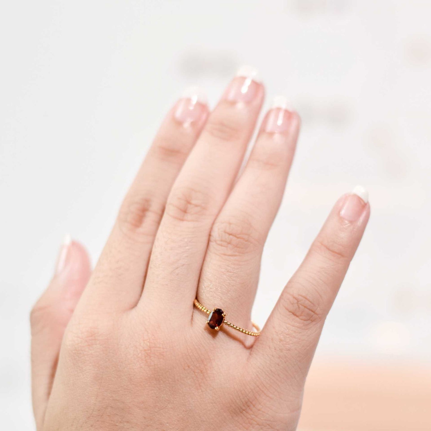 6 x 4 mm Oval cut Red Garnet Twisted Ring