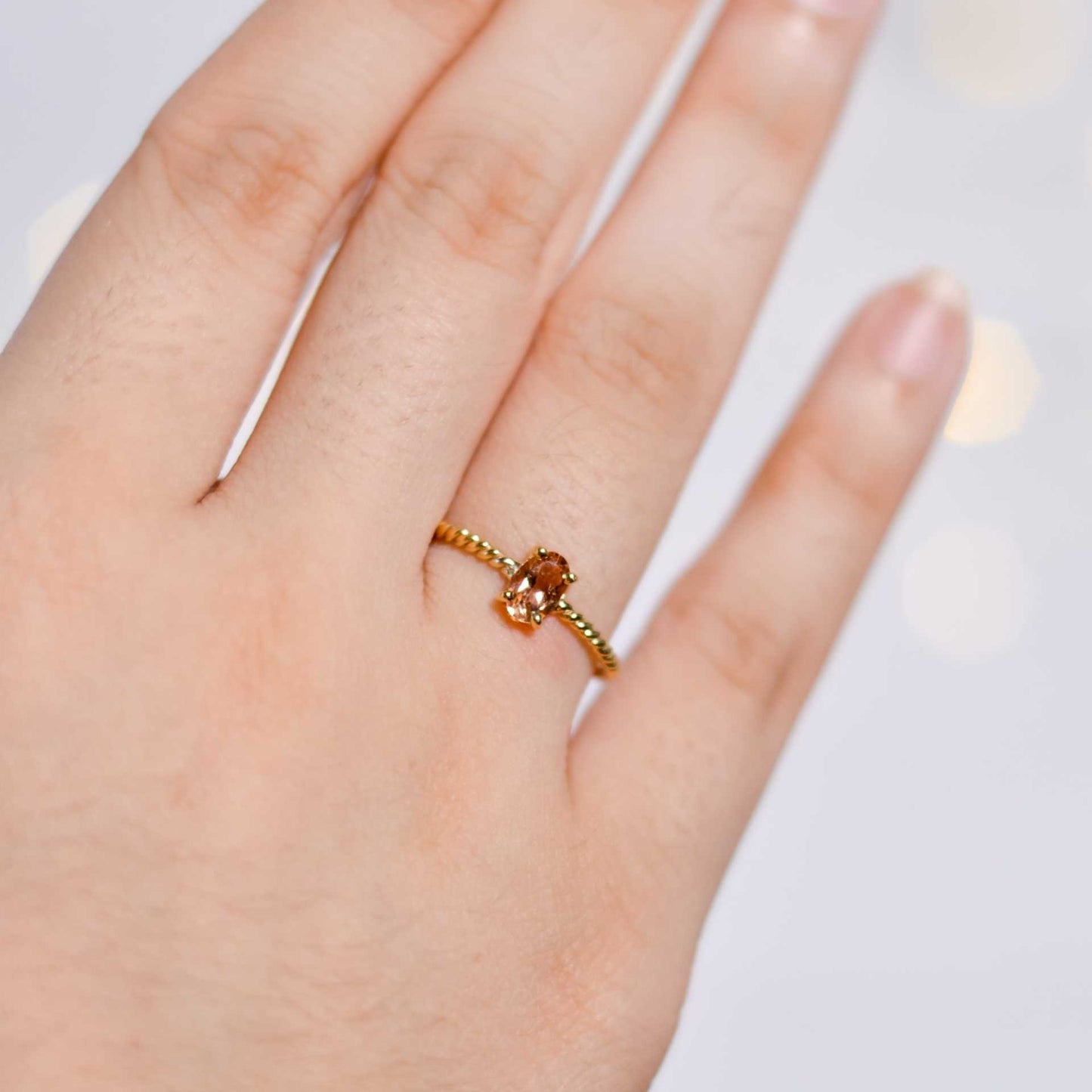 6 x 4 mm Oval cut Peach Tourmaline Twisted Ring