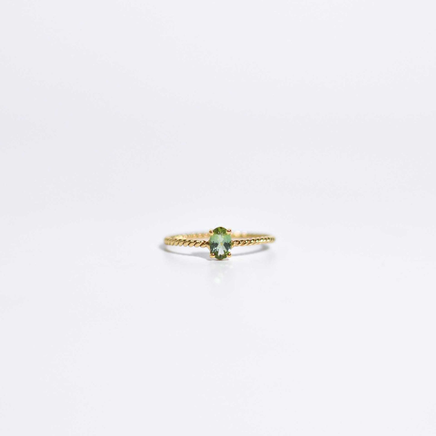 6 x 4 mm Oval cut Light Green Tourmaline Twisted Ring