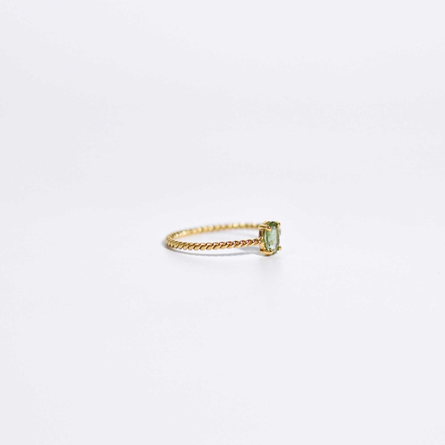 6 x 4 mm Oval cut Light Green Tourmaline Twisted Ring