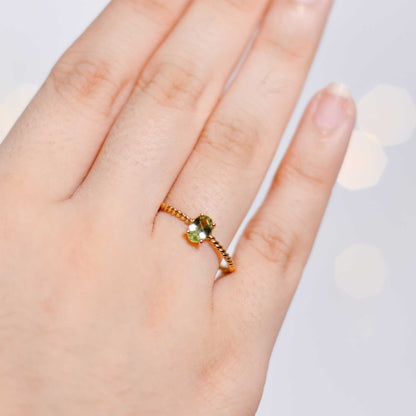 6 x 4 mm Oval cut Light Green Tourmaline Twisted Ring