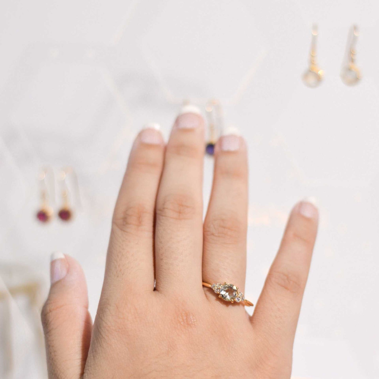 6 mm Round cut White Topaz with 3 Cz side stones Ring