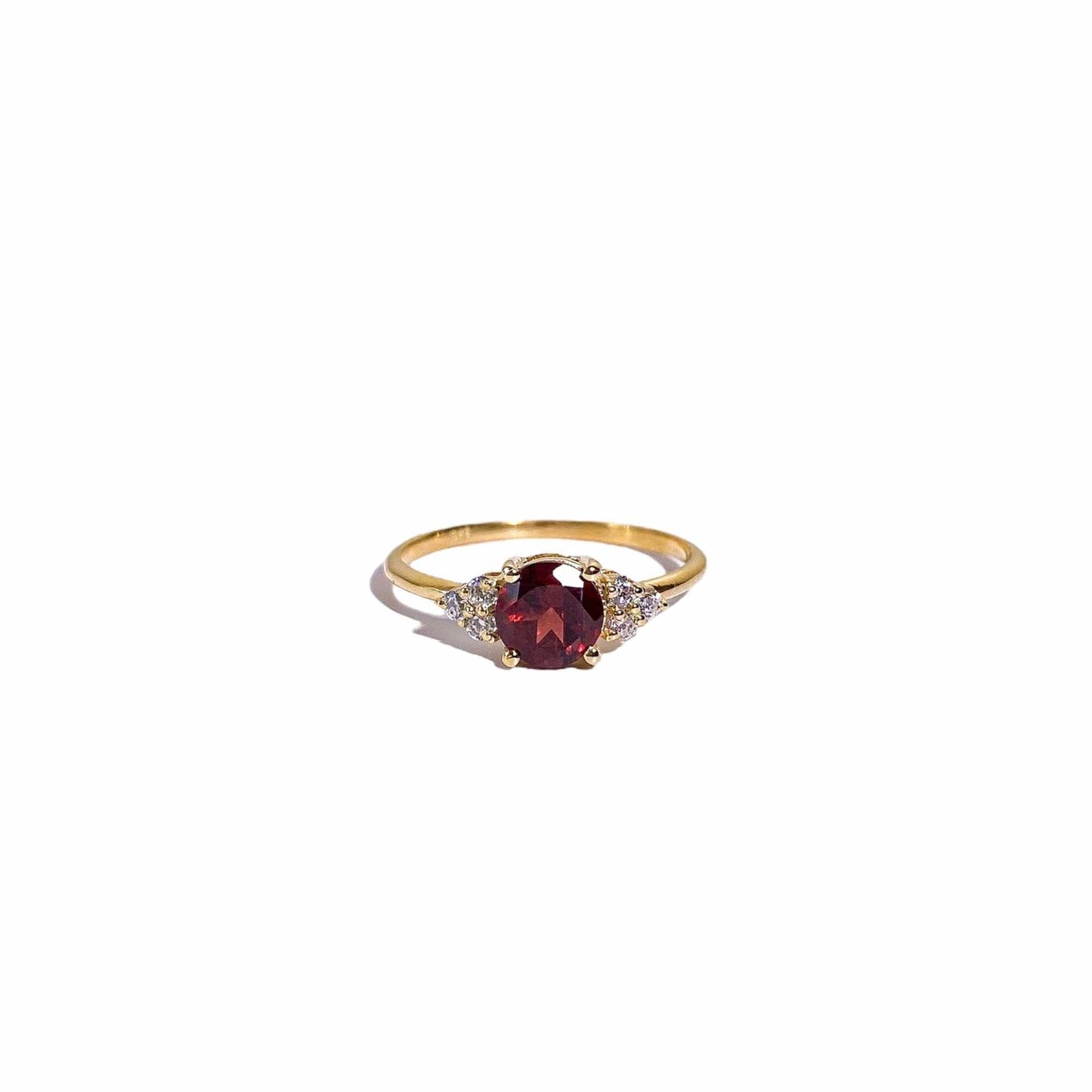 6 mm Round cut Red Garnet with 3 Cz side stones Ring