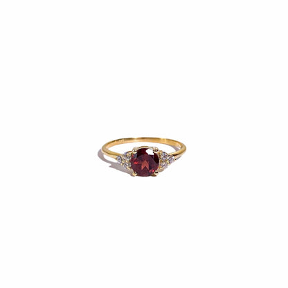 6 mm Round cut Red Garnet with 3 Cz side stones Ring