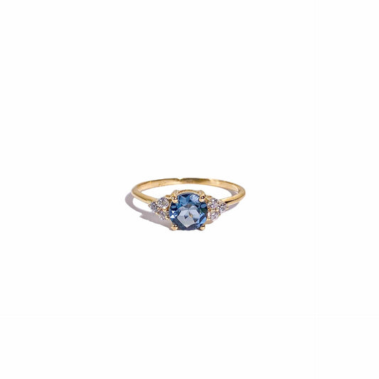 6 mm Round cut London Blue Topaz with 3 Cz side stones Ring